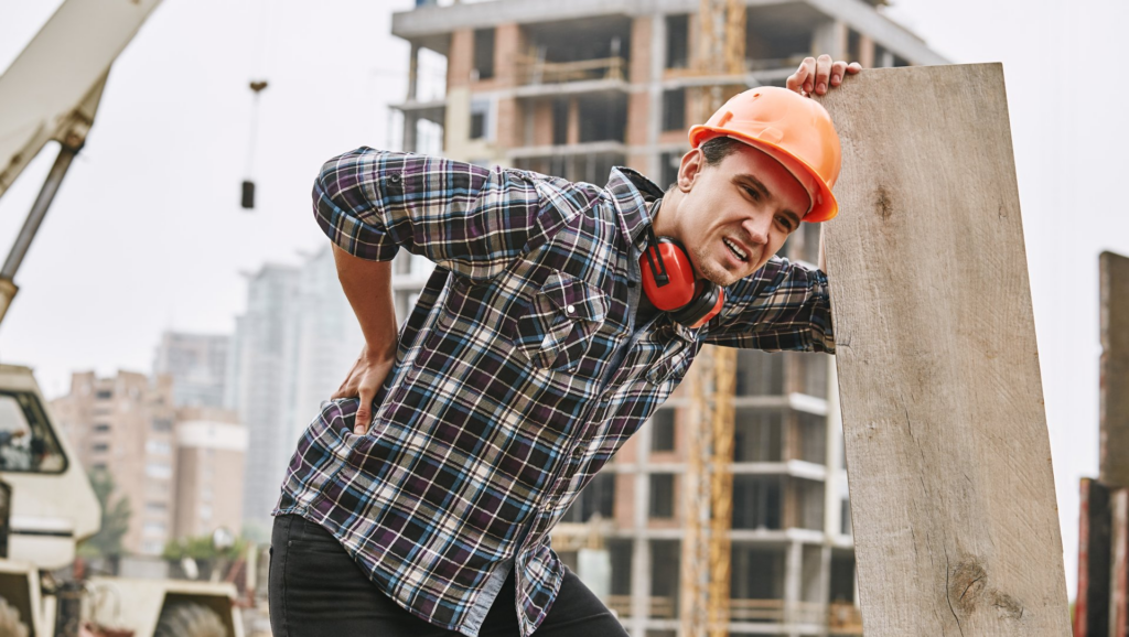 Construction Worker suffering from low back pain.